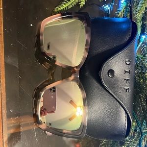 Two pair of Diff sunglasses.